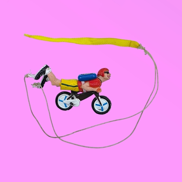 Vintage 90s Hippie Peace Bicyclist Sky Diving Parachutist Toy - Picture 1 of 6